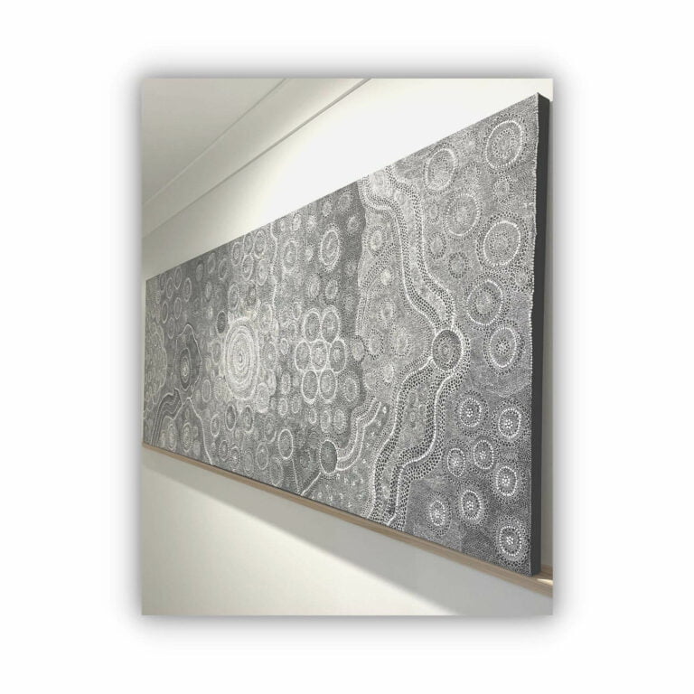 black and white aboriginal painting in raw oak frame