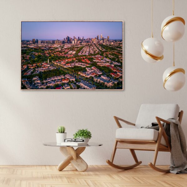 an aerial view over port melbourne during sunset creating a beautiful purple colour sky