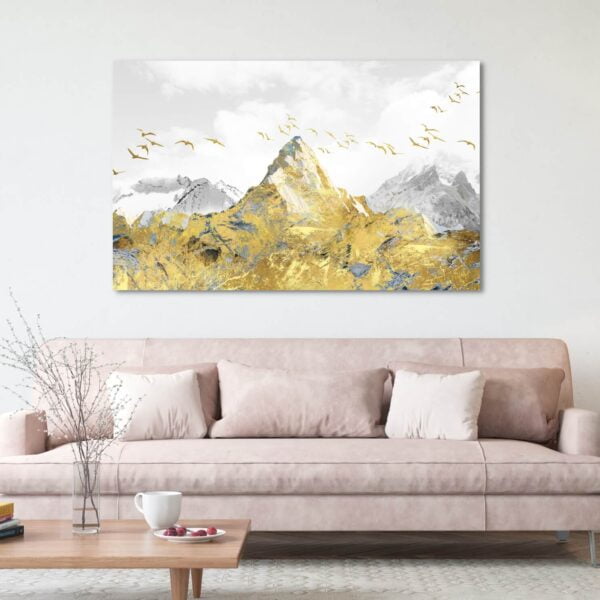 Beautiful canvas artwork of a golden mountain peak with golden birds flying around.