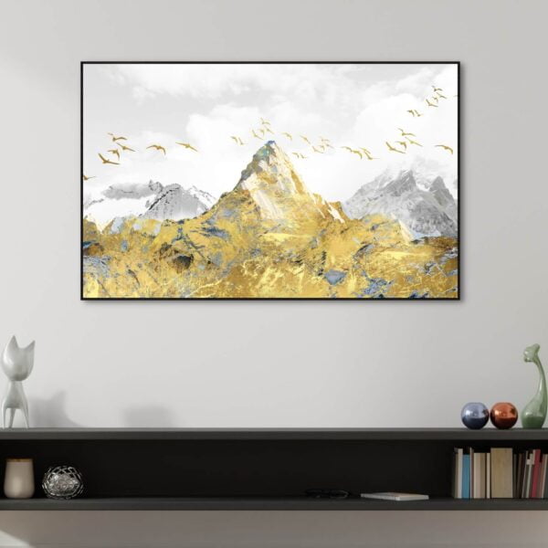 Beautiful canvas artwork of a golden mountain peak with golden birds flying around.