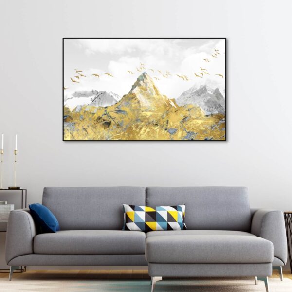 Beautiful canvas artwork of a golden mountain peak with golden birds flying around.